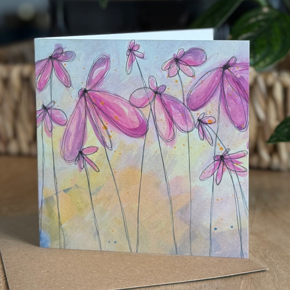 Portrait view of a 6×6 blank acrylic and ink note card “Starlit Daisies” with kraft envelope on tabletop—perfect blank thank you cards, baby shower thank you cards, graduation thank you cards, wedding note.