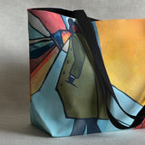 Studio close up of "Ashlie + Archer" large canvas tote bag, used as a reusable beach bag tote, everyday carryall, or cute tote bag for women. If you like Free People tote bags, then you’ll love this stylish weekender.