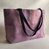 Studio front view of "Sunset" large canvas tote bag, used as a reusable beach bag tote, everyday carryall, or cute tote bag for women. If you like Free People tote bags, then you’ll love this stylish weekender.
