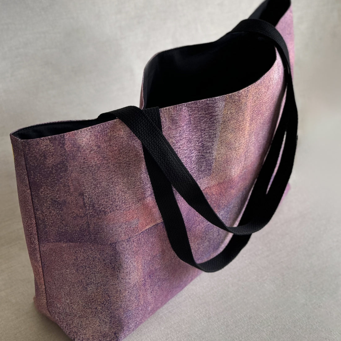 Studio open view of "Sunset" large canvas tote bag, used as a reusable beach bag tote, everyday carryall, or cute tote bag for women. If you like Free People tote bags, then you’ll love this stylish weekender.