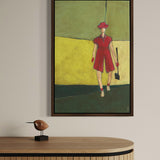 Framed wall art of a female golfer in pink displayed in a floating dark wood frame, modern artwork for home decor, displayed above a wooden cabinet.