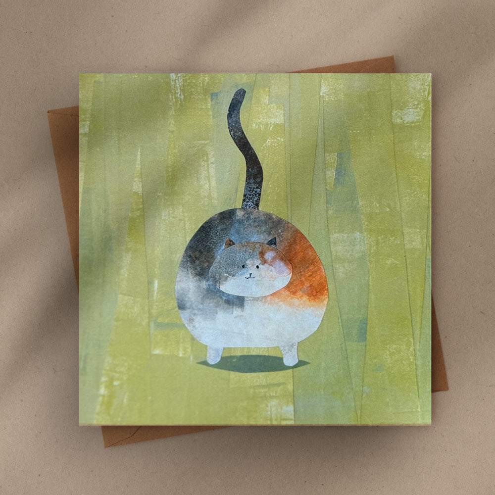 Flat lay of a 6×6 blank collage note card “Happy Cat” with kraft envelope on tabletop—perfect for cat lovers, blank thank you cards, calico cat cards, baby shower thank you cards, graduation thank you cards, wedding note.
