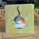 Portrait view of a 6×6 blank collage note card “Happy Cat” with kraft envelope on tabletop—perfect for cat lovers, blank thank you cards, calico cat cards, baby shower thank you cards, graduation thank you cards, wedding note.