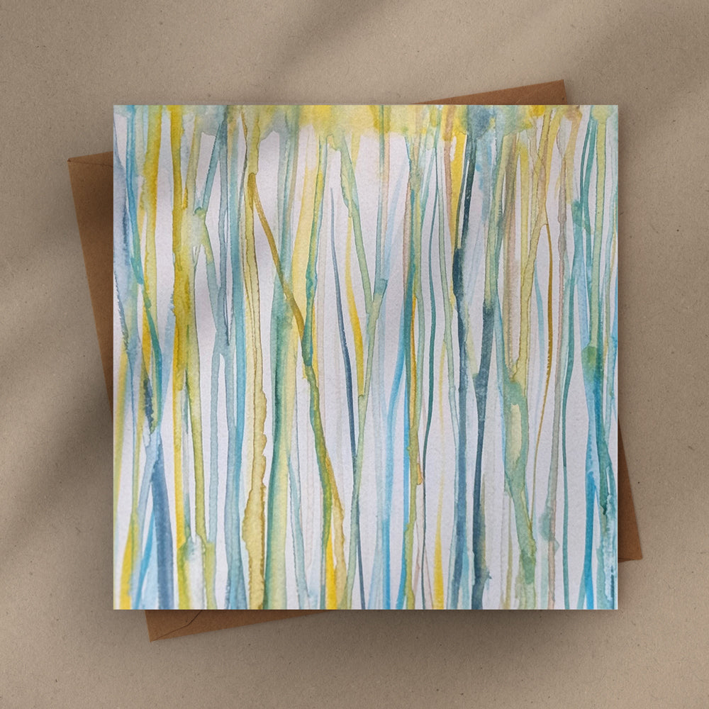 Flat lay of a 6×6 blank watercolor note card “Verdent Streams” with kraft envelope on tabletop—perfect blank thank you cards, baby shower thank you cards, graduation thank you cards, wedding note.