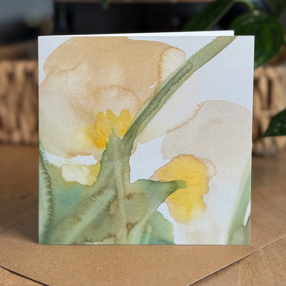 Portrait view of a 6×6 blank watercolor note card “Gentle Anemones” propped on a kraft envelope against a natural tabletop—perfect blank thank you cards, baby shower thank you cards, graduation thank you cards, wedding note.