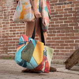 Women carrying "Ashlie + Archer" large canvas tote bag, used as a reusable beach bag tote, everyday carryall, or cute tote bag for women. If you like Free People tote bags, then you’ll love this stylish weekender.