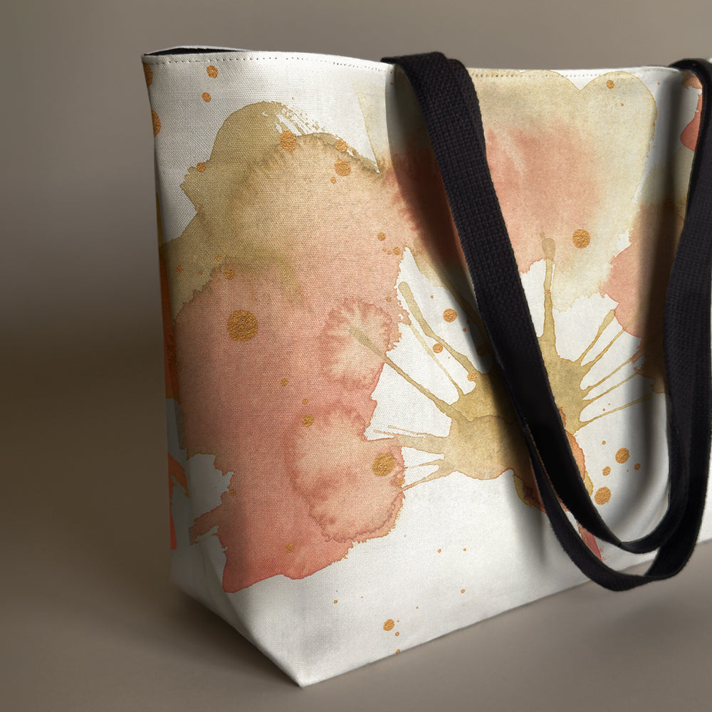 Studio close up view of a large canvas tote bag, used as a reusable beach bag tote, everyday carryall, or cute tote bag for women. If you like Free People tote bags, then you’ll love this stylish weekender.