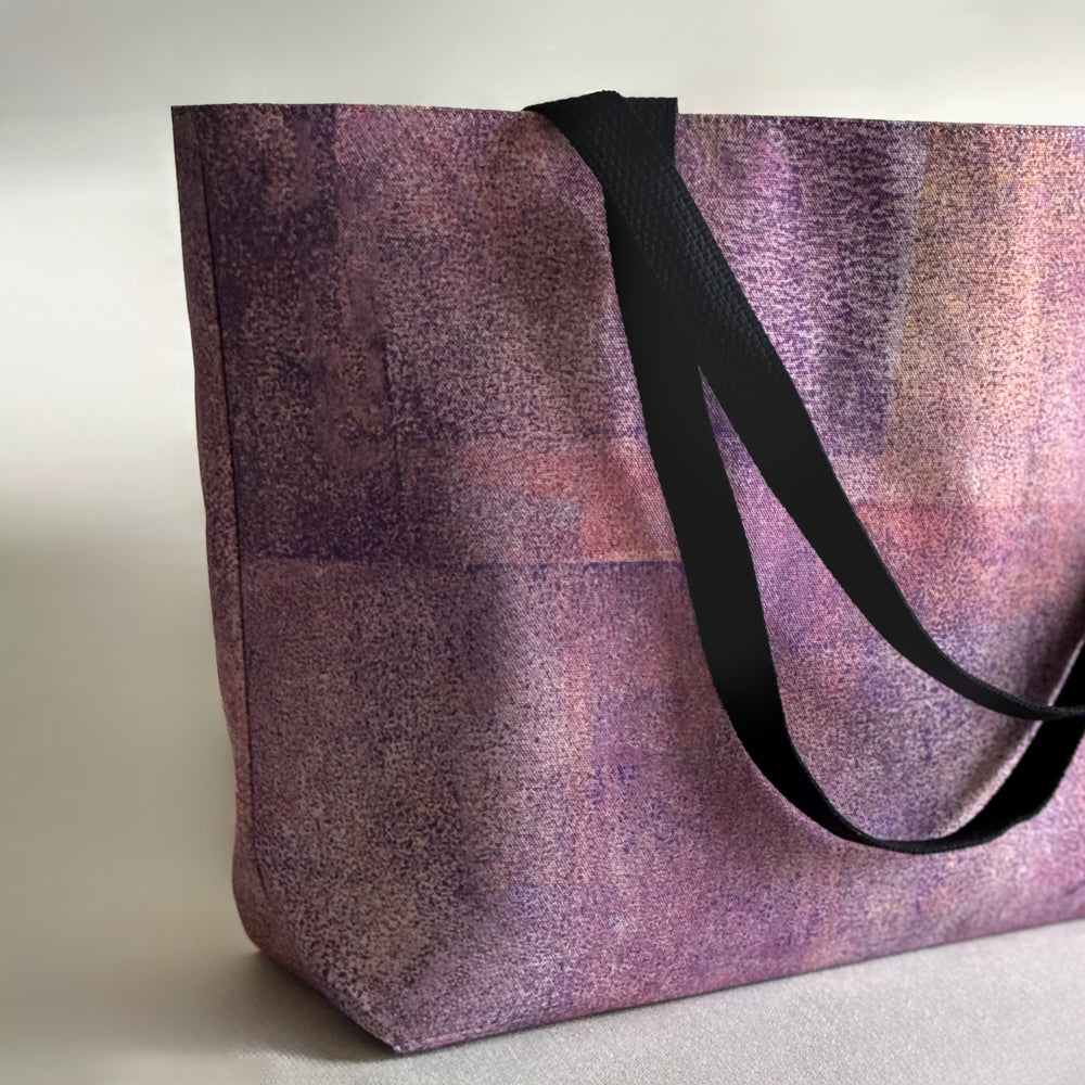 Studio close up of "Sunset" large canvas tote bag, used as a reusable beach bag tote, everyday carryall, or cute tote bag for women. If you like Free People tote bags, then you’ll love this stylish weekender.