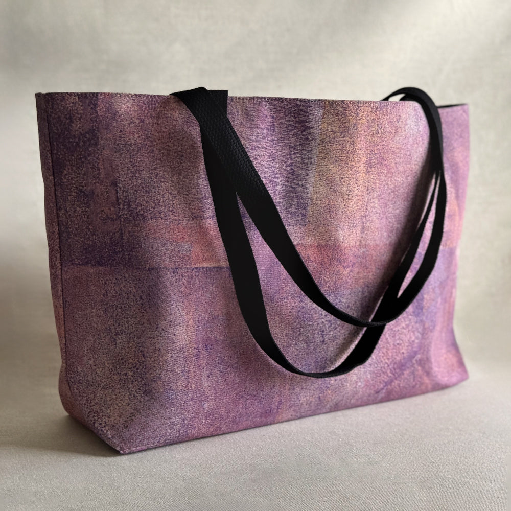 Studio front view of "Sunset" large canvas tote bag, used as a reusable beach bag tote, everyday carryall, or cute tote bag for women. If you like Free People tote bags, then you’ll love this stylish weekender.